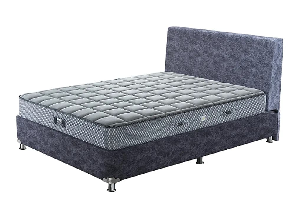 Peps Spine Guard mattress on an upholstered bed