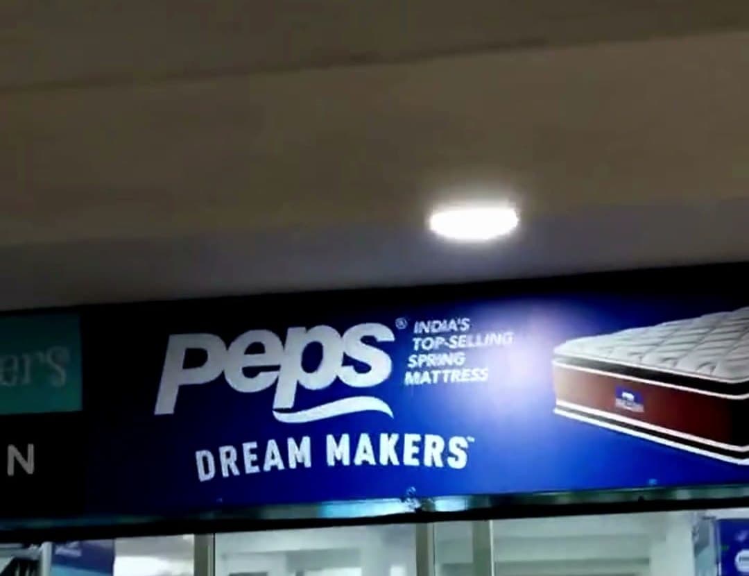 Front of the Peps Dream Makers store at Trinity Enclave, Old Madras Road
