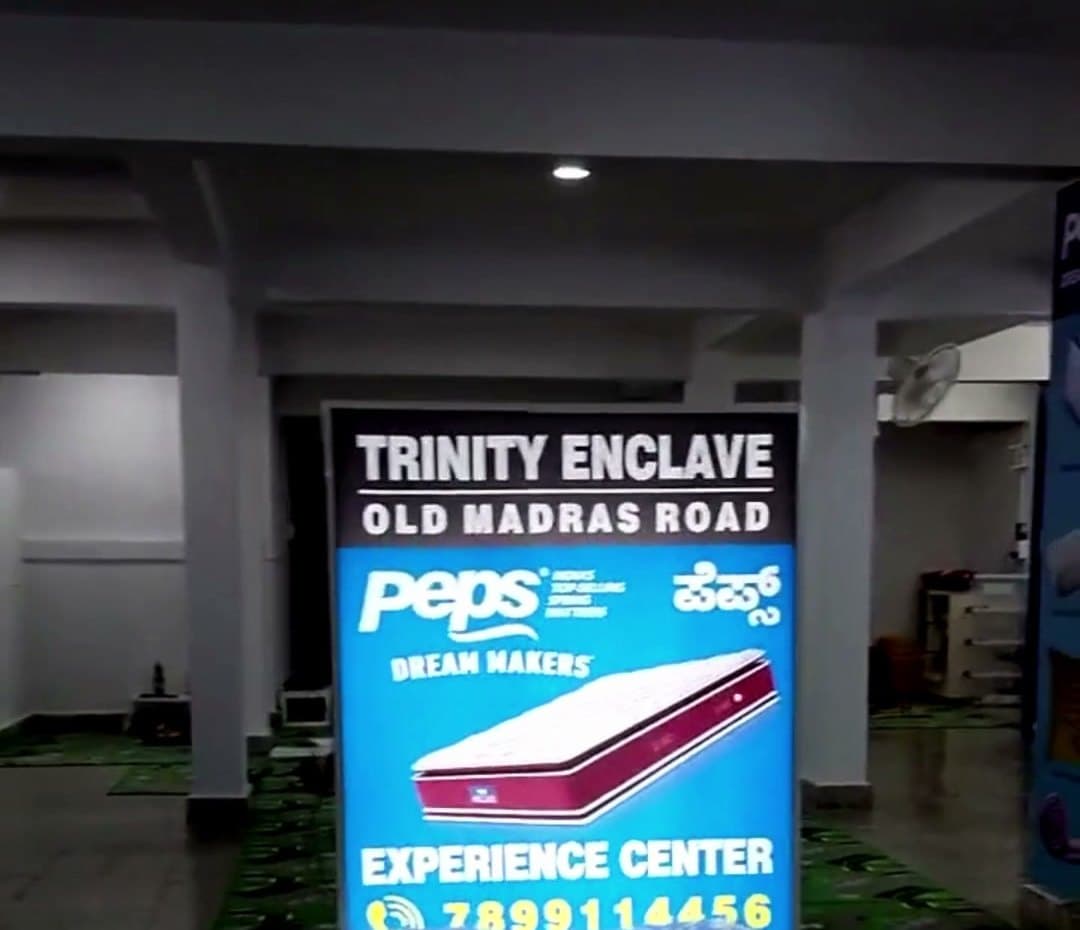 Trinity Enclave sign showing the Peps Experience Center